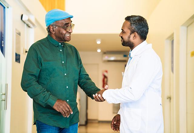 patient shaking hands with doctor